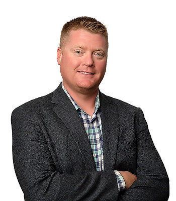 Portrait of Drew Glaser, REALTOR®.